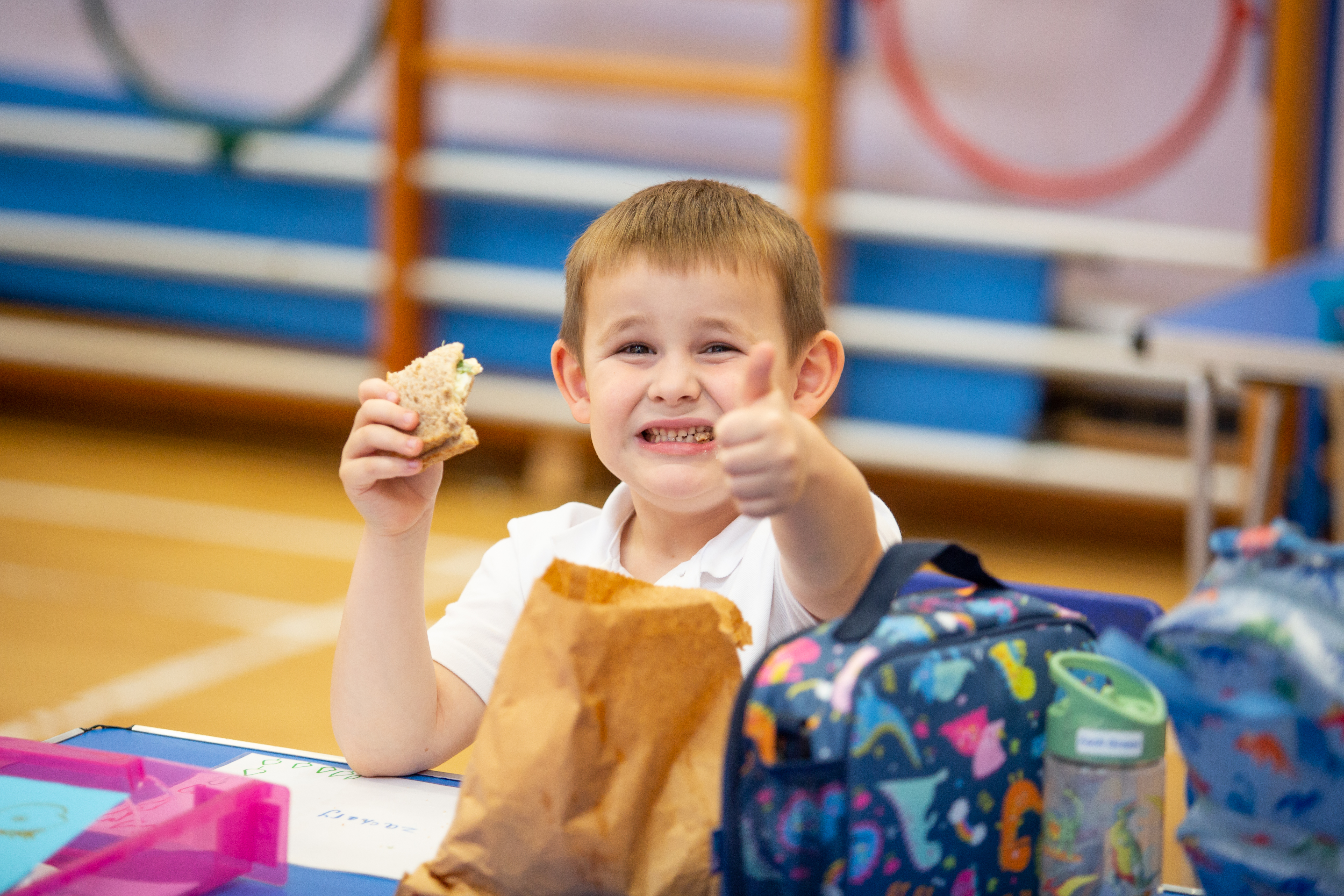 student thumbs up